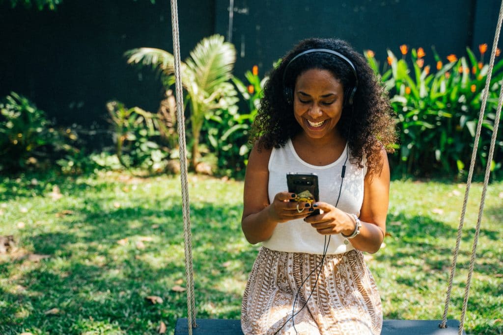 woman listening to music with headphone on