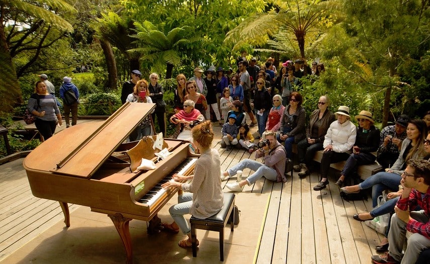 girl practicing piano in the park